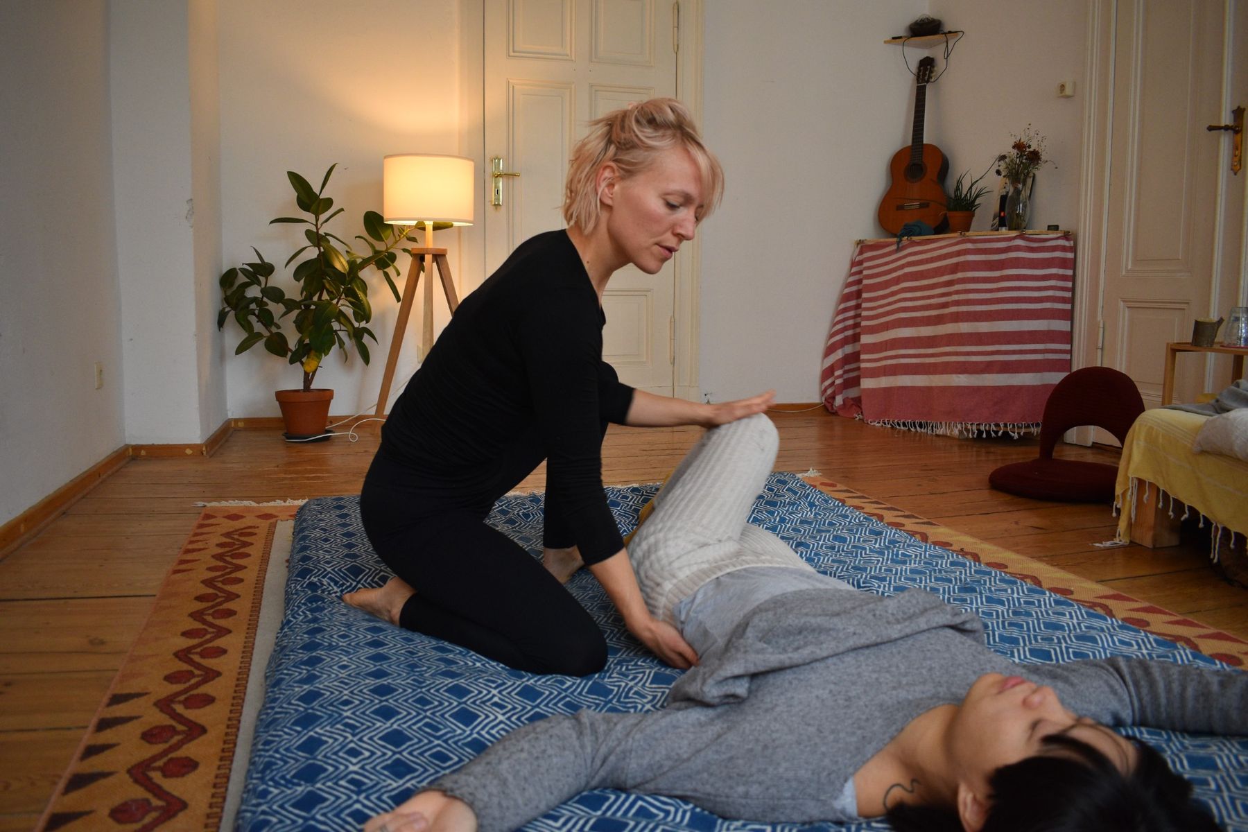Caroline giving a Thai massage